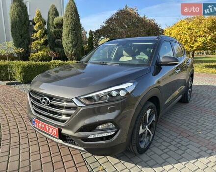 Коричневый Хендай Туксон, объемом двигателя 2 л и пробегом 100 тыс. км за 23500 $, фото 2 на Automoto.ua