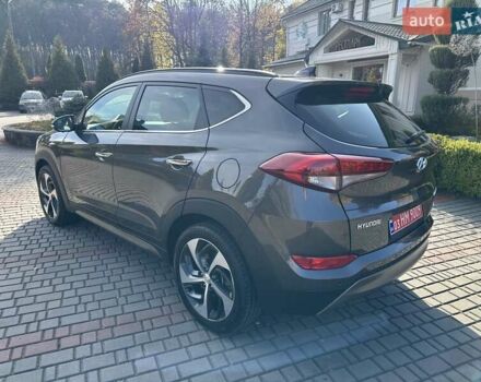 Коричневый Хендай Туксон, объемом двигателя 2 л и пробегом 100 тыс. км за 23500 $, фото 5 на Automoto.ua