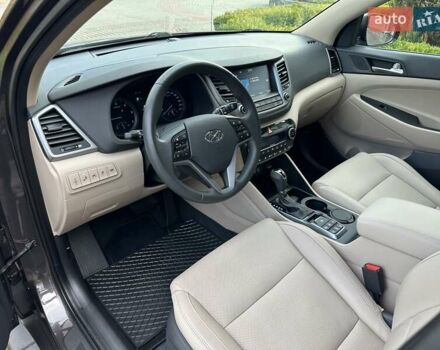 Коричневый Хендай Туксон, объемом двигателя 2 л и пробегом 100 тыс. км за 23500 $, фото 25 на Automoto.ua