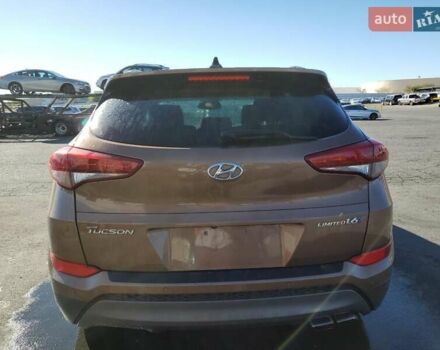 Коричневый Хендай Туксон, объемом двигателя 1.6 л и пробегом 96 тыс. км за 2500 $, фото 5 на Automoto.ua
