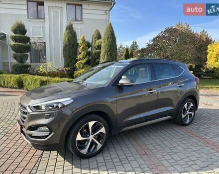Коричневый Хендай Туксон, объемом двигателя 2 л и пробегом 100 тыс. км за 23500 $, фото 3 на Automoto.ua