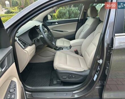 Коричневый Хендай Туксон, объемом двигателя 2 л и пробегом 100 тыс. км за 23500 $, фото 24 на Automoto.ua