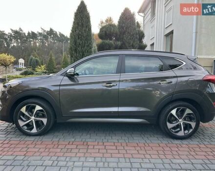 Коричневый Хендай Туксон, объемом двигателя 2 л и пробегом 100 тыс. км за 23500 $, фото 16 на Automoto.ua