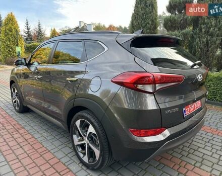 Коричневый Хендай Туксон, объемом двигателя 2 л и пробегом 100 тыс. км за 23500 $, фото 17 на Automoto.ua