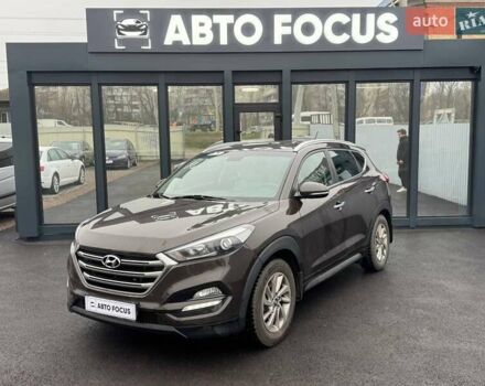 Коричневый Хендай Туксон, объемом двигателя 2 л и пробегом 115 тыс. км за 20990 $, фото 3 на Automoto.ua