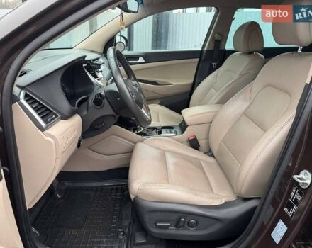 Коричневый Хендай Туксон, объемом двигателя 2 л и пробегом 115 тыс. км за 20990 $, фото 8 на Automoto.ua