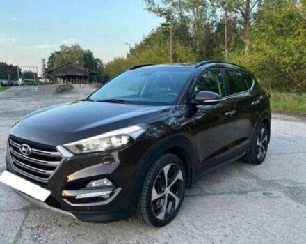 Коричневый Хендай Туксон, объемом двигателя 2 л и пробегом 140 тыс. км за 12100 $, фото 4 на Automoto.ua