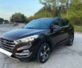 Коричневый Хендай Туксон, объемом двигателя 2 л и пробегом 140 тыс. км за 12100 $, фото 4 на Automoto.ua