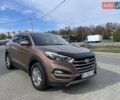 Коричневый Хендай Туксон, объемом двигателя 2 л и пробегом 115 тыс. км за 14500 $, фото 1 на Automoto.ua