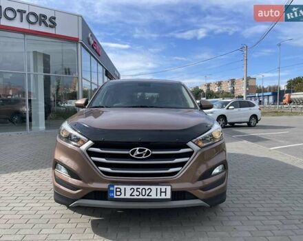Коричневый Хендай Туксон, объемом двигателя 2 л и пробегом 115 тыс. км за 14200 $, фото 17 на Automoto.ua