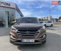 Коричневый Хендай Туксон, объемом двигателя 2 л и пробегом 115 тыс. км за 14500 $, фото 17 на Automoto.ua