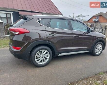 Коричневий Хендай Туксон, об'ємом двигуна 2 л та пробігом 87 тис. км за 19300 $, фото 10 на Automoto.ua