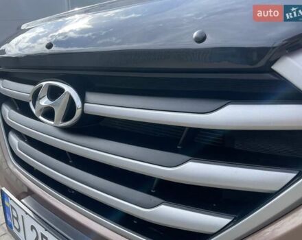 Коричневый Хендай Туксон, объемом двигателя 2 л и пробегом 115 тыс. км за 14200 $, фото 10 на Automoto.ua