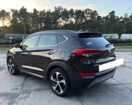 Коричневый Хендай Туксон, объемом двигателя 2 л и пробегом 140 тыс. км за 12100 $, фото 5 на Automoto.ua