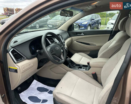 Коричневий Хендай Туксон, об'ємом двигуна 2 л та пробігом 212 тис. км за 11999 $, фото 8 на Automoto.ua