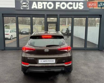 Коричневый Хендай Туксон, объемом двигателя 2 л и пробегом 115 тыс. км за 20990 $, фото 6 на Automoto.ua