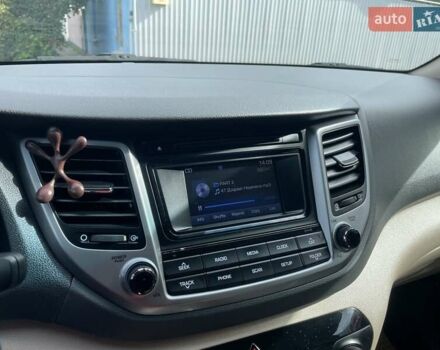 Коричневый Хендай Туксон, объемом двигателя 2 л и пробегом 115 тыс. км за 14200 $, фото 26 на Automoto.ua