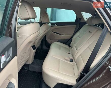 Коричневый Хендай Туксон, объемом двигателя 2 л и пробегом 115 тыс. км за 20990 $, фото 9 на Automoto.ua