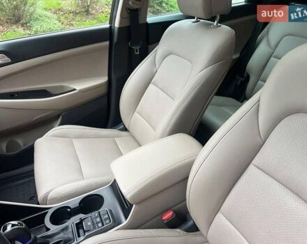 Коричневий Хендай Туксон, об'ємом двигуна 2 л та пробігом 108 тис. км за 18700 $, фото 39 на Automoto.ua