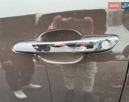 Коричневый Хендай Туксон, объемом двигателя 2 л и пробегом 115 тыс. км за 20990 $, фото 28 на Automoto.ua