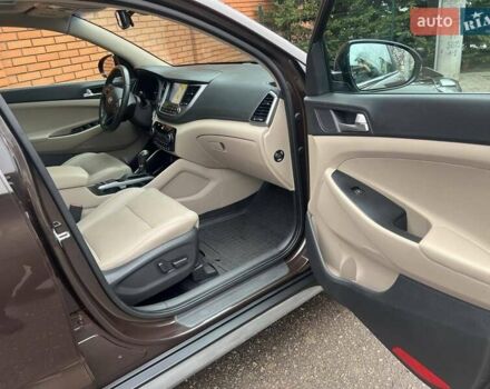 Коричневий Хендай Туксон, об'ємом двигуна 2 л та пробігом 108 тис. км за 18700 $, фото 42 на Automoto.ua