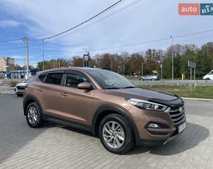 Коричневый Хендай Туксон, объемом двигателя 2 л и пробегом 115 тыс. км за 14200 $, фото 2 на Automoto.ua