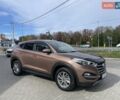 Коричневый Хендай Туксон, объемом двигателя 2 л и пробегом 115 тыс. км за 14200 $, фото 2 на Automoto.ua