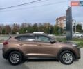 Коричневый Хендай Туксон, объемом двигателя 2 л и пробегом 115 тыс. км за 14200 $, фото 8 на Automoto.ua