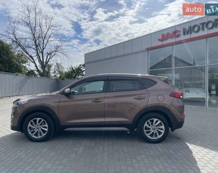 Коричневый Хендай Туксон, объемом двигателя 2 л и пробегом 115 тыс. км за 14200 $, фото 6 на Automoto.ua