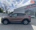 Коричневый Хендай Туксон, объемом двигателя 2 л и пробегом 115 тыс. км за 14200 $, фото 6 на Automoto.ua
