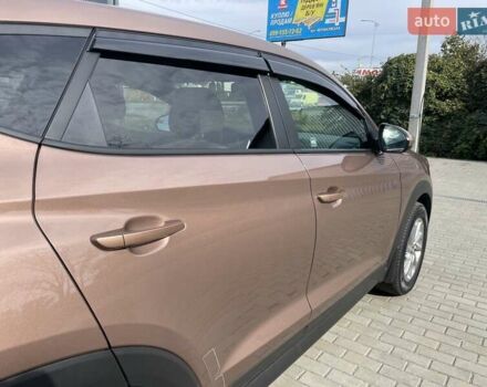 Коричневый Хендай Туксон, объемом двигателя 2 л и пробегом 115 тыс. км за 14200 $, фото 23 на Automoto.ua
