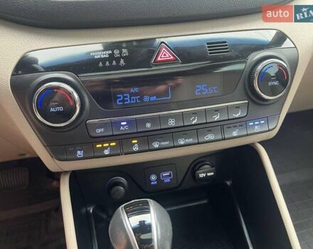 Коричневий Хендай Туксон, об'ємом двигуна 2 л та пробігом 108 тис. км за 18700 $, фото 37 на Automoto.ua