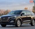 Коричневый Хендай Туксон, объемом двигателя 2 л и пробегом 100 тыс. км за 18900 $, фото 2 на Automoto.ua