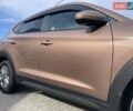 Коричневый Хендай Туксон, объемом двигателя 2 л и пробегом 115 тыс. км за 14500 $, фото 21 на Automoto.ua