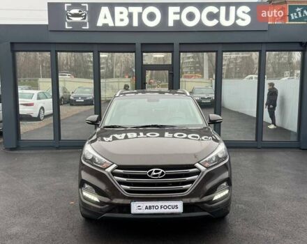 Коричневый Хендай Туксон, объемом двигателя 2 л и пробегом 115 тыс. км за 20990 $, фото 2 на Automoto.ua