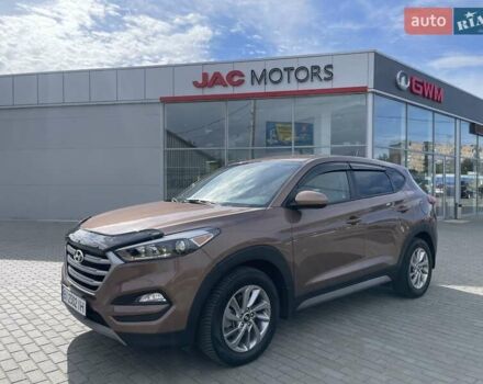 Коричневый Хендай Туксон, объемом двигателя 2 л и пробегом 115 тыс. км за 14200 $, фото 14 на Automoto.ua