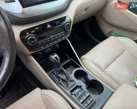 Коричневый Хендай Туксон, объемом двигателя 2 л и пробегом 115 тыс. км за 20990 $, фото 22 на Automoto.ua