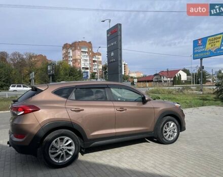 Коричневый Хендай Туксон, объемом двигателя 2 л и пробегом 115 тыс. км за 14200 $, фото 5 на Automoto.ua