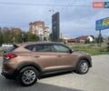Коричневый Хендай Туксон, объемом двигателя 2 л и пробегом 115 тыс. км за 14200 $, фото 5 на Automoto.ua