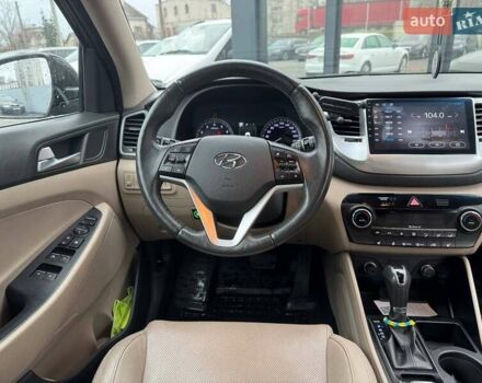 Коричневый Хендай Туксон, объемом двигателя 2 л и пробегом 115 тыс. км за 20990 $, фото 13 на Automoto.ua