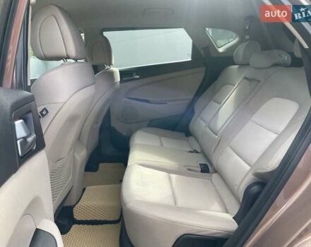 Коричневый Хендай Туксон, объемом двигателя 2 л и пробегом 115 тыс. км за 14200 $, фото 34 на Automoto.ua