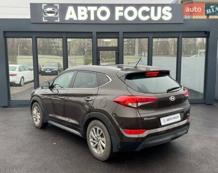 Коричневый Хендай Туксон, объемом двигателя 2 л и пробегом 115 тыс. км за 20990 $, фото 7 на Automoto.ua