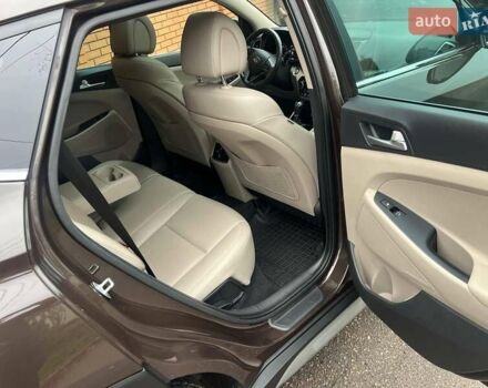 Коричневий Хендай Туксон, об'ємом двигуна 2 л та пробігом 108 тис. км за 18700 $, фото 43 на Automoto.ua