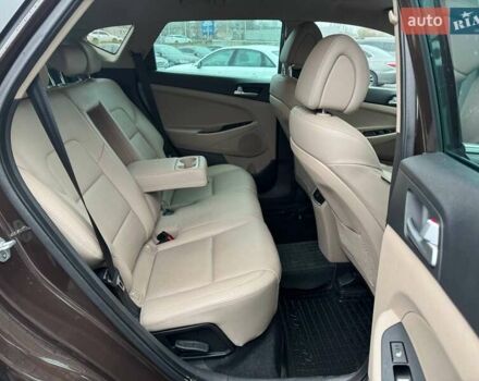 Коричневый Хендай Туксон, объемом двигателя 2 л и пробегом 115 тыс. км за 20990 $, фото 10 на Automoto.ua