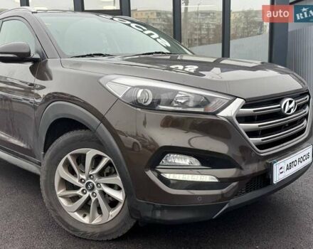Коричневый Хендай Туксон, объемом двигателя 2 л и пробегом 115 тыс. км за 20990 $, фото 1 на Automoto.ua