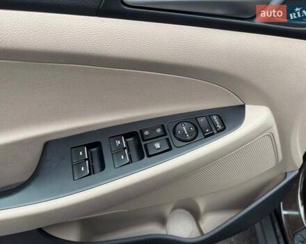 Коричневый Хендай Туксон, объемом двигателя 2 л и пробегом 115 тыс. км за 20990 $, фото 15 на Automoto.ua