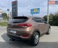 Коричневый Хендай Туксон, объемом двигателя 2 л и пробегом 115 тыс. км за 14500 $, фото 3 на Automoto.ua