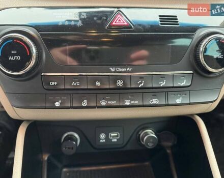 Коричневый Хендай Туксон, объемом двигателя 2 л и пробегом 115 тыс. км за 20990 $, фото 24 на Automoto.ua