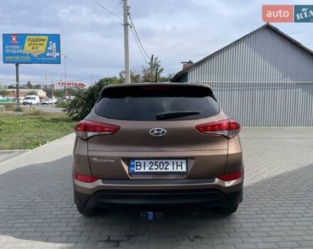 Коричневый Хендай Туксон, объемом двигателя 2 л и пробегом 115 тыс. км за 14200 $, фото 7 на Automoto.ua