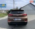 Коричневый Хендай Туксон, объемом двигателя 2 л и пробегом 115 тыс. км за 14200 $, фото 7 на Automoto.ua
